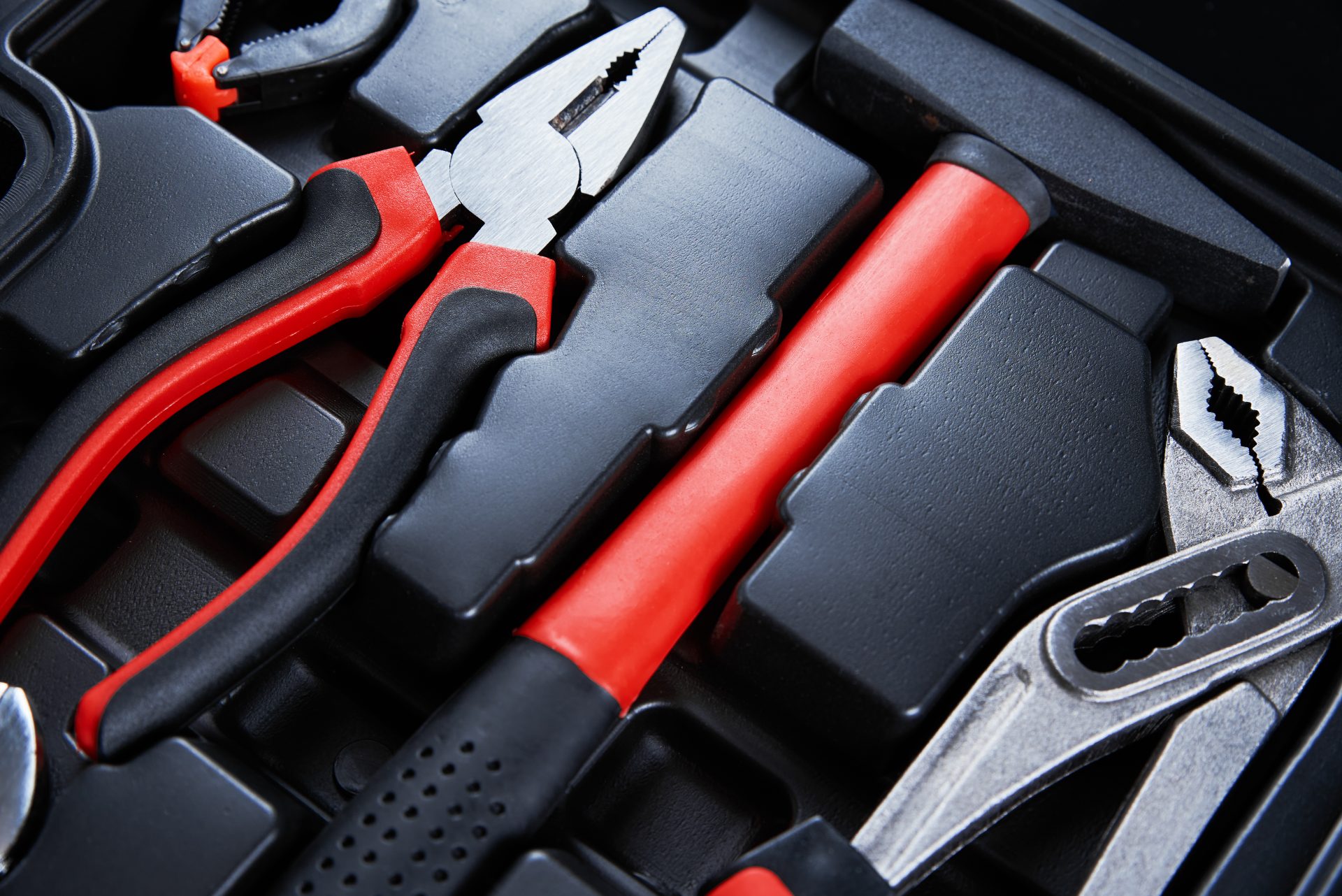 Set of tools for repair and maintenance on black background